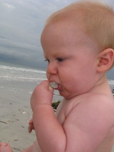 THEN - He was 7 months old and enjoyed immensely the taste of sand.